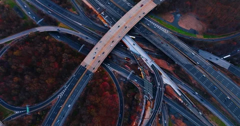Crossing overpass above a wide freeway with construction, New Jersey Stock Footage 335694719
