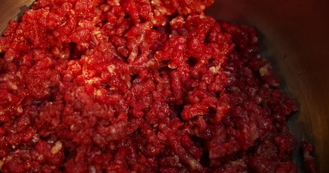 The crossing is poured into meat and egg. Mix for cutlets Stock Footage 114952084