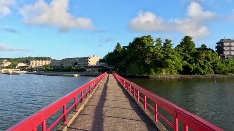 Crossing the red bridge Stock Footage 248747214
