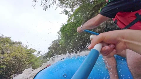 Crossing River Rapids in Blue Inflatable Raft. 動画素材 329528853