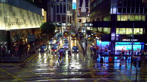 CROSSING ROAD NIGHT RAIN CENTRAL HONG KONG CHINA Stock-Footage 67024016