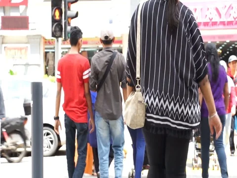 Crossing the road in traffic light. Stock Footage 112610668