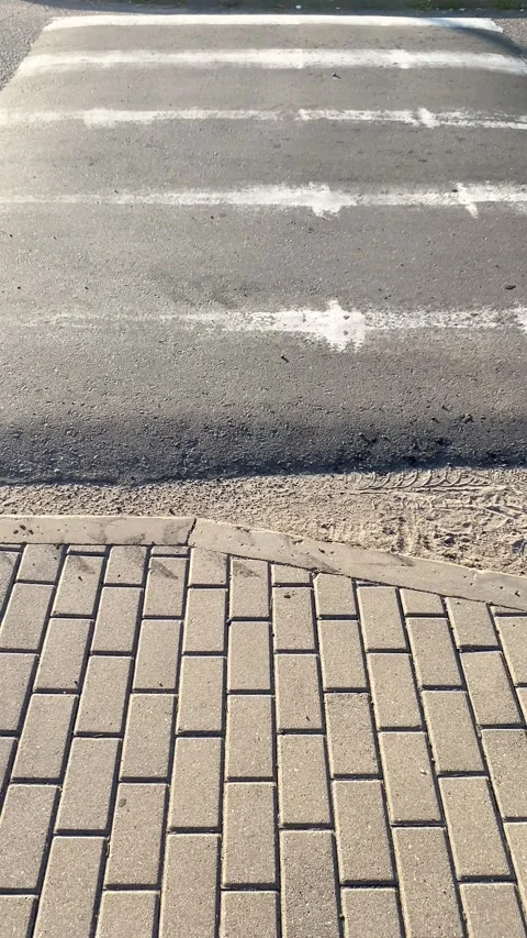 Crossing the road. Vertical video Stock Footage 281175757