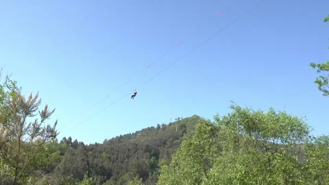 Crossing the sky in the zip line - 40 Stock Footage 310048993