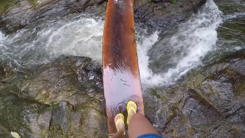 Crossing a small bridge in a waterfall place Stock Footage 83687633