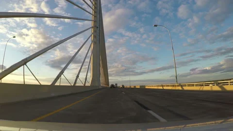 Crossing the span of a multi lane suspension bridge with traffic Video stock 153262262
