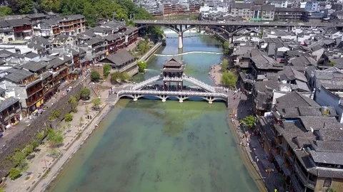 Crossing stone bridge Stock Footage 98403194