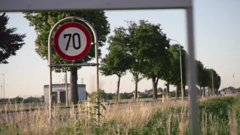 Crossing street with speed limit Stock Footage 170764689