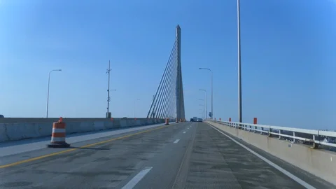 Crossing a Suspension Bridge 4K Stock Footage 128670423