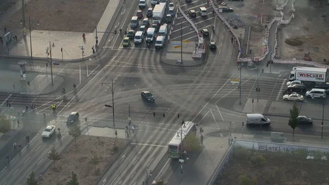 Crossroad in Berlin with lots of Traffic - Time Lapse Stock Footage 101430544