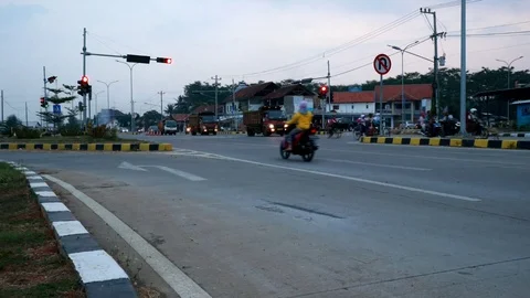 The crossroad condition of a road, which is full of motorists and Stock Footage 116036859