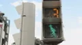 Crossroad light switches to red, people not allowed to walk, traffic rules HD Footage