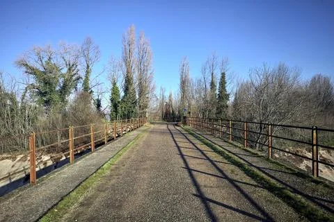 Crossroads between a dirt path and a bridge Stock Photos