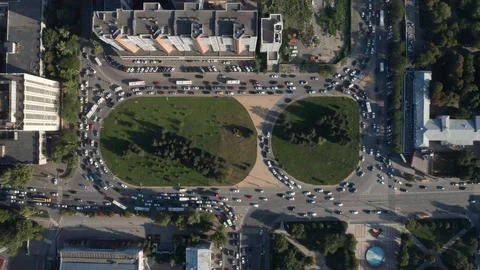 Crossroads with a circular traffic, view from above, time lapse Stock Footage 128428728