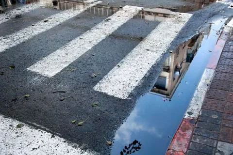 Crosswalk puddle Stock Photos