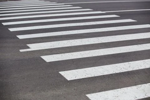 Crosswalk on the road Stock Photos