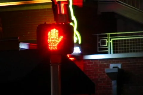 Crosswalk Sign at a Busy Intersection Stock Footage 372680