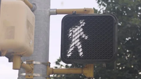 A crosswalk signal changes Stock Footage 108757581