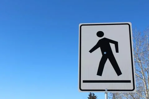 Crosswalk on a White Rectangle Sign Stock Photos
