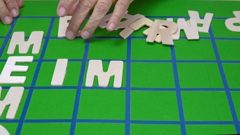 Crosswords for Elderly ,help improve memory &amp; brain Stock Footage 84978093