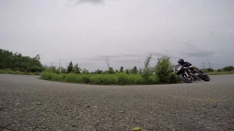 Crotch rocket rails a corner in smooth slow motion Stock Footage 52139946