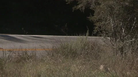 Crotch rocket uphill 1 Stock Footage 1064406