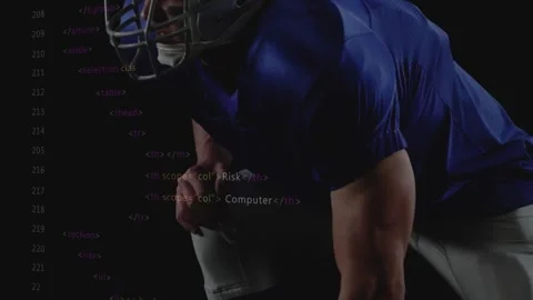 Crouching footballer with rising code overlay and shield icon illustrating Stock Footage 317740316