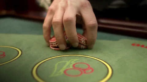 A croupier with gambling chips at a gambling table. Stock Footage 51851059