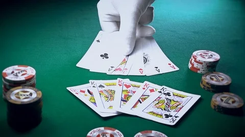 The Croupier Puts Cards On The Game Table Stock-Footage 70637419