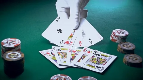 The Croupier Puts Cards On The Game Table Stock-Footage 70677667