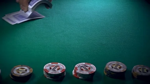 The Croupier Puts Cards On The Game Table Stock-Footage 70677684