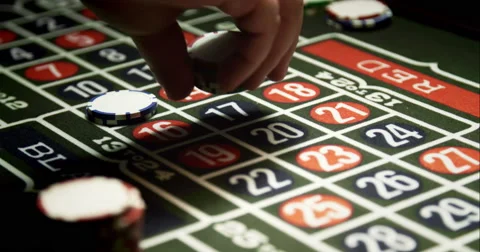 Croupier Putting Chips on Roulette Stock Footage 49408224
