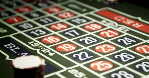 Croupier Putting Chips on Roulette Stock Footage 49409027