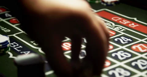 Croupier Putting Chips on Roulette Stock Footage 49409067