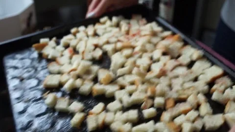 Croutons on a baking sheet 스톡 동영상 125311978