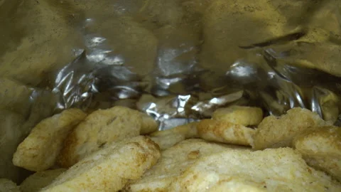 Croutons inside the package close-up Video stock 162864326