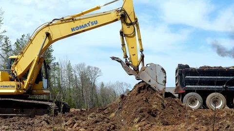 CROW WING CO, MN - 10 MAY 2023: Dump truck leaves construction site. Video stock 250652717