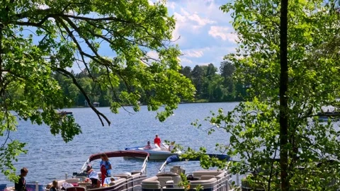 CROW WING CO, MN - 30 MAY 2021: Boating on a beautiful Minnesota lake. Stock Footage 155135124
