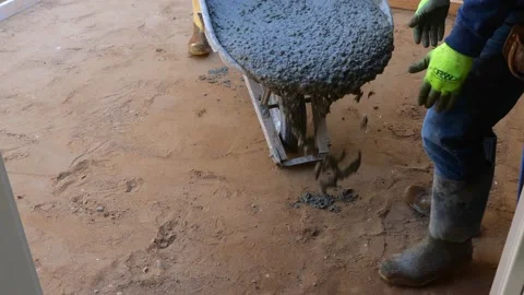 CROW WING CO, MN - 4 MAY 2021: Wet concrete dumped for new patio. Stock Footage 155511328