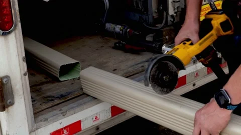 CROW WING CO, MN - 5 MAY 2021: Rain gutter cut by construction worker. Stock Footage 156051418