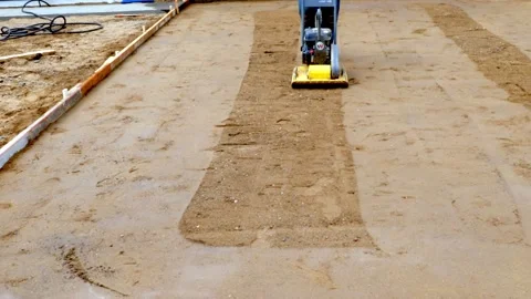 CROW WING CO, MN - 5 MAY 2021: Small yellow compactor used on dirt. Stock Footage 156760131