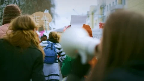 Crowd of activists at strike action event. Students political demonstration 4k. Stock Footage 124995332