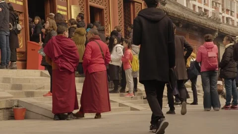 Crowd and Monks Lining Up at Temple Entrance in Beijing, China Stock Footage 345686002