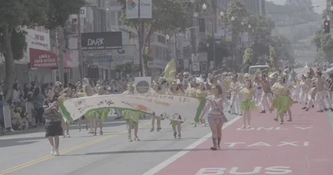 Crowd and Performers Marching at Carnival in San Francisco in Slow Motion Stock Footage 131361654
