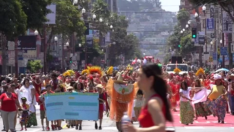 Crowd and Performers Marching at the San Francisco Carnival Stock Footage 131356690
