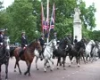 Crowd and Police walk towards Buckingham Palace, London England GFSD SD Footage