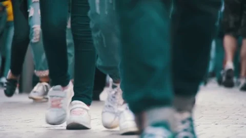 Crowd Anonymous People Walking on the Street. Crowd Feet. Slow Motion Stock Footage