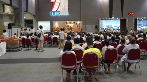 Crowd Audience Watch &amp; Sit Indoor Thai Buddhist Monk Ceremony Festival Event Stock Footage 248799453