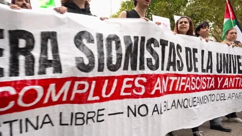 Crowd with banner protesting against the Palestinian genocide in Gaza_4 스톡 동영상 254367280