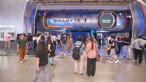 Crowd at blue technology booth during Computex Taipei Stock Footage 335479334